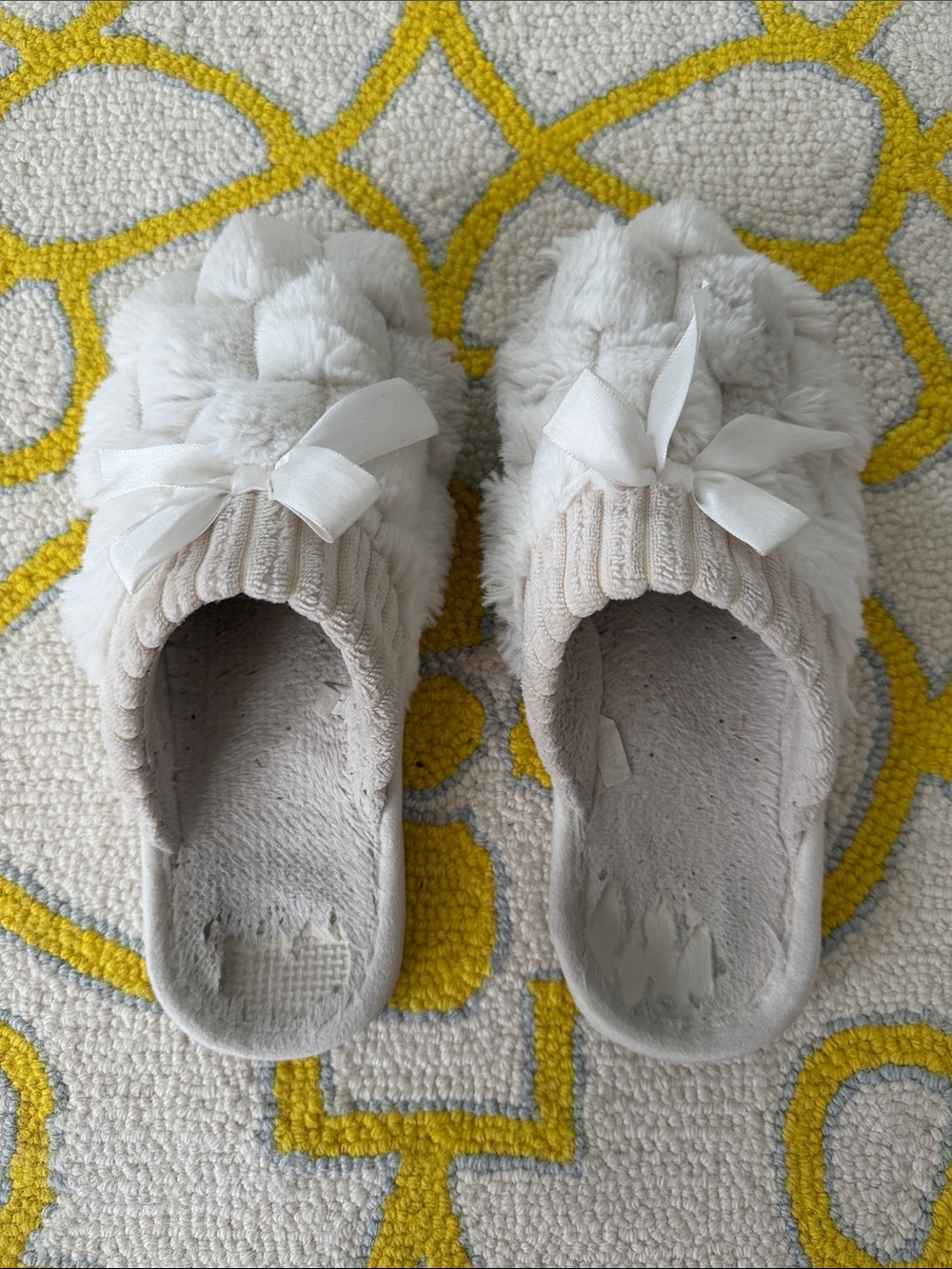 The cutest little well worn slippers! Sz 10